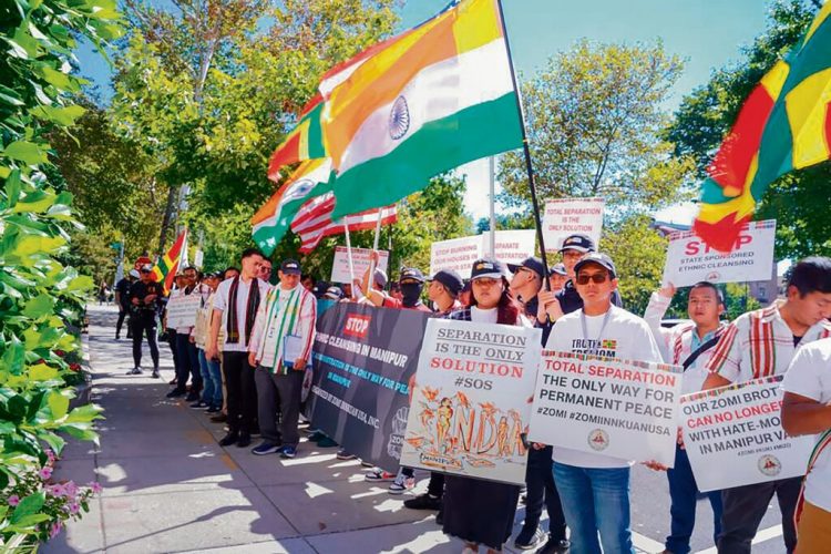 **EDS: IMAGE TO GO WITH STORY** Washington: Members of Manipur's Kuki-Zomi community stage a protest demanding separation of the state, in Washington US. (PTI Photo) (PTI09_18_2023_000160B)